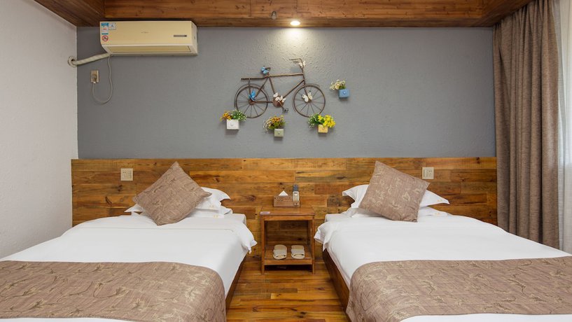 Imagen de la habitación del Hotel Floral Hotel Moganshan Tianquan. Foto 10