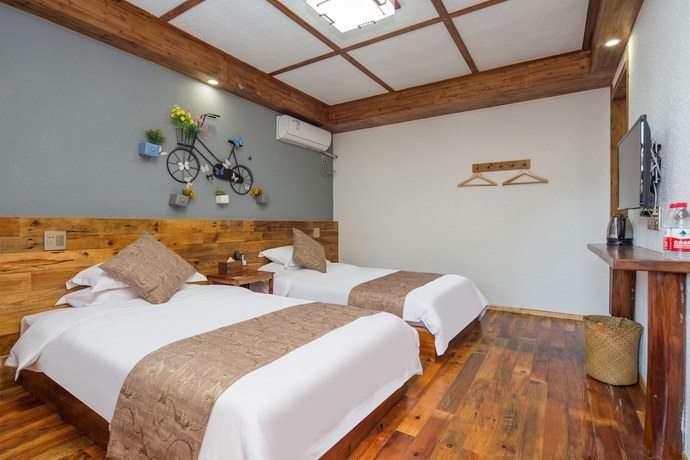 Imagen de la habitación del Hotel Floral Hotel Moganshan Tianquan. Foto 11