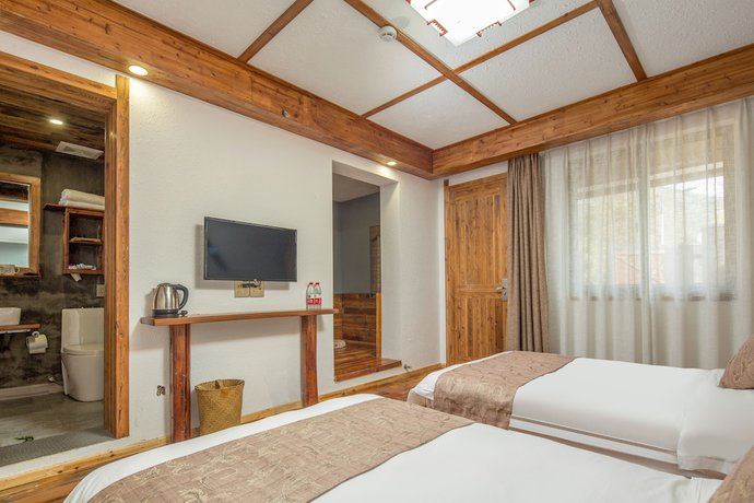 Imagen de la habitación del Hotel Floral Hotel Moganshan Tianquan. Foto 13