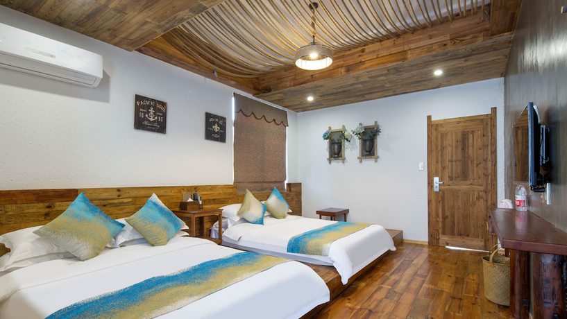 Imagen de la habitación del Hotel Floral Hotel Moganshan Tianquan. Foto 14