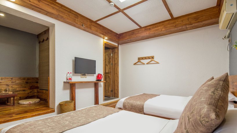 Imagen de la habitación del Hotel Floral Hotel Moganshan Tianquan. Foto 15