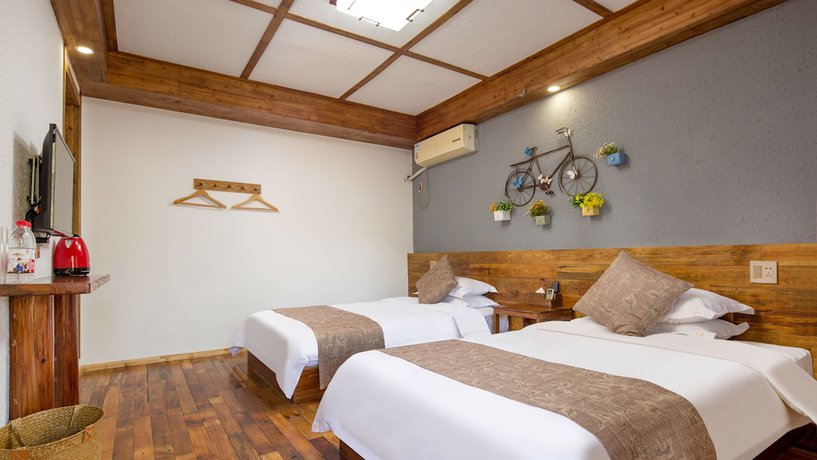 Imagen de la habitación del Hotel Floral Hotel Moganshan Tianquan. Foto 16