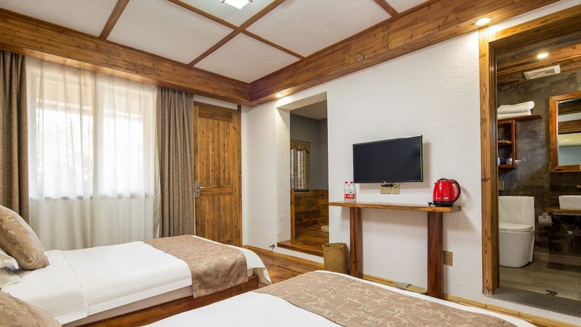 Imagen de la habitación del Hotel Floral Hotel Moganshan Tianquan. Foto 18