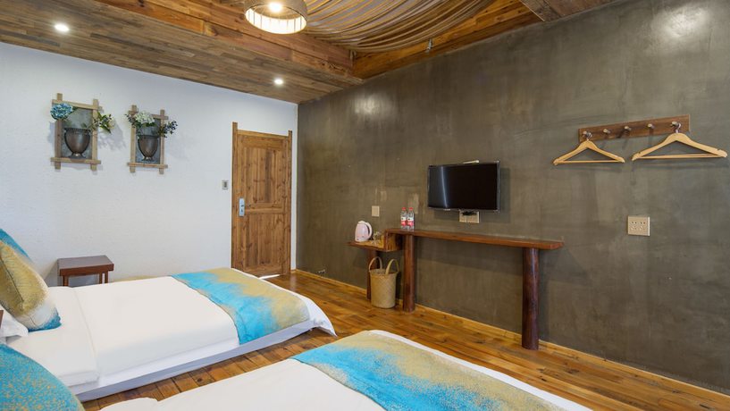 Imagen de la habitación del Hotel Floral Hotel Moganshan Tianquan. Foto 19