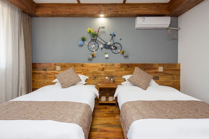 Imagen de la habitación del Hotel Floral Hotel Moganshan Tianquan. Foto 20