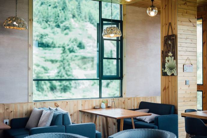 Imagen del bar/restaurante del Hotel Floral Hotel Moonlit Villa LongJi. Foto 3