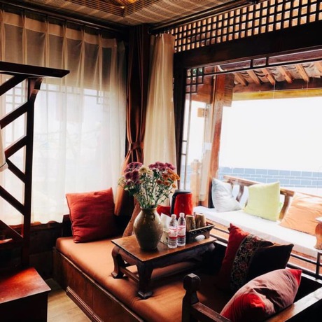 Imagen de la habitación del Hotel Floral Hotel Northern Cloudborn Lijiang. Foto 4