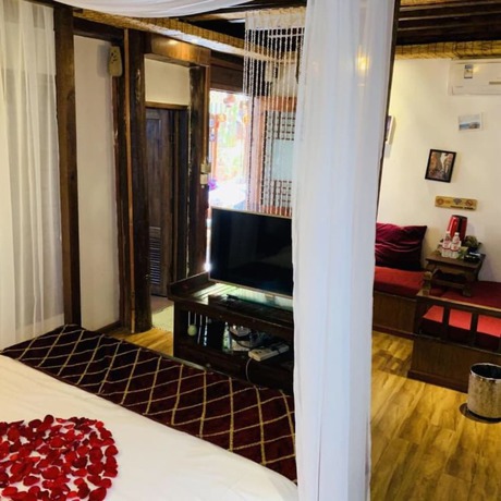 Imagen de la habitación del Hotel Floral Hotel Northern Cloudborn Lijiang. Foto 8