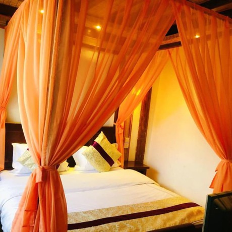 Imagen de la habitación del Hotel Floral Hotel Northern Cloudborn Lijiang. Foto 10