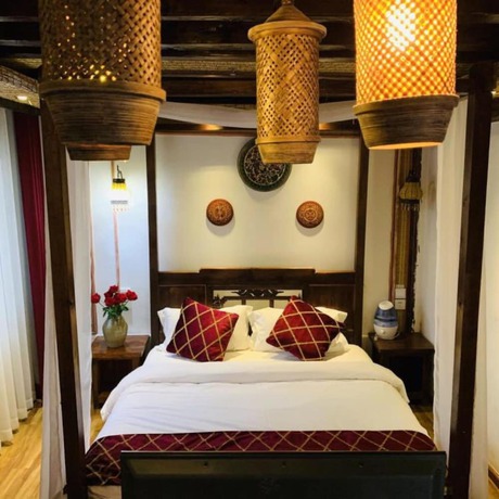 Imagen de la habitación del Hotel Floral Hotel Northern Cloudborn Lijiang. Foto 11