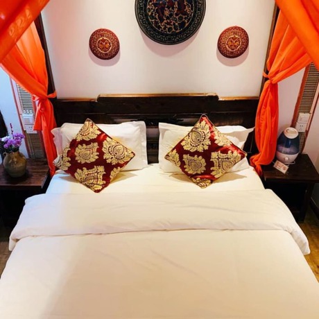 Imagen de la habitación del Hotel Floral Hotel Northern Cloudborn Lijiang. Foto 13