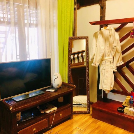 Imagen de la habitación del Hotel Floral Hotel Northern Cloudborn Lijiang. Foto 15