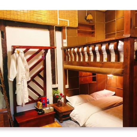 Imagen de la habitación del Hotel Floral Hotel Northern Cloudborn Lijiang. Foto 16