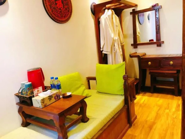 Imagen de la habitación del Hotel Floral Hotel Northern Cloudborn Lijiang. Foto 17