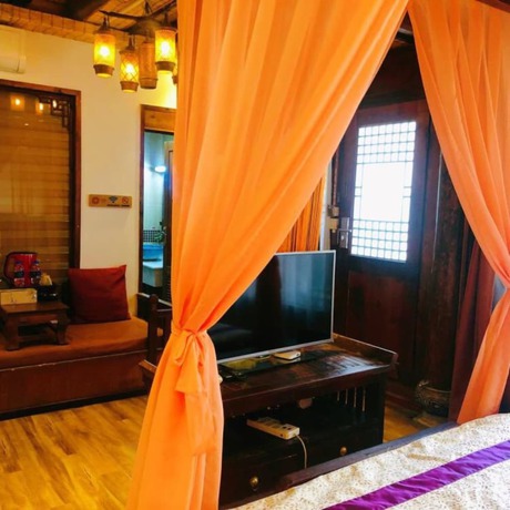 Imagen de la habitación del Hotel Floral Hotel Northern Cloudborn Lijiang. Foto 18