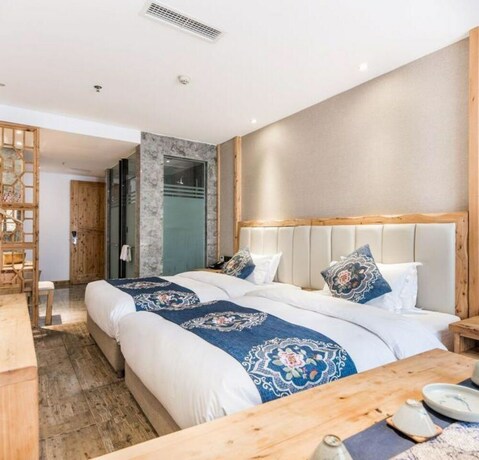 Imagen de la habitación del Hotel Floral Hotel Qingshe Chengdu. Foto 8