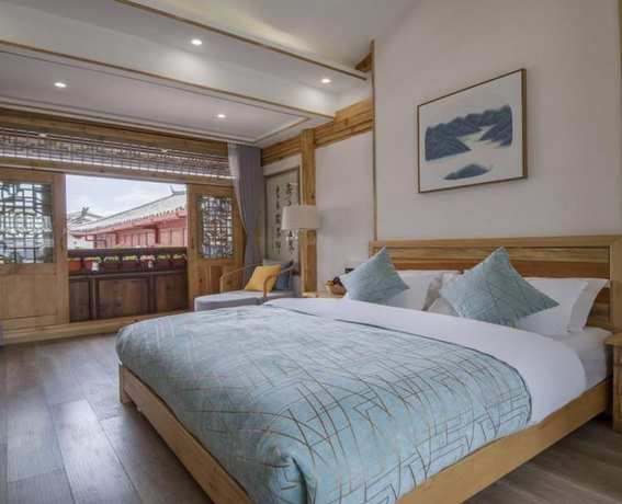 Imagen de la habitación del Hotel Floral Hotel Qu An He Feng Lijiang. Foto 12