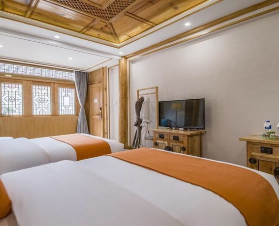 Imagen de la habitación del Hotel Floral Hotel Qu An He Feng Lijiang. Foto 15