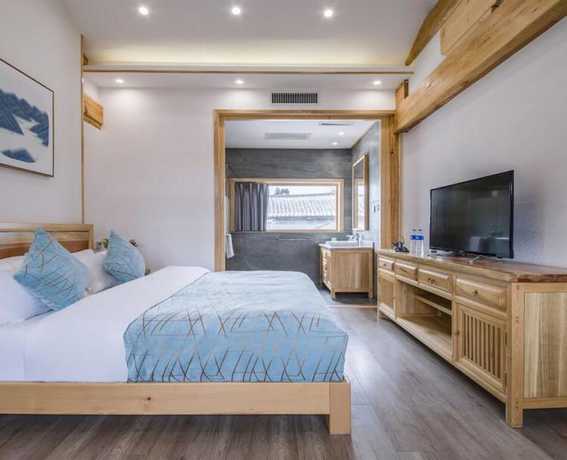 Imagen de la habitación del Hotel Floral Hotel Qu An He Feng Lijiang. Foto 17