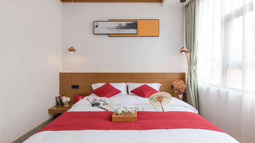 Imagen de la habitación del Hotel Floral Hotel Sanshengyishu Seaview Villa. Foto 4