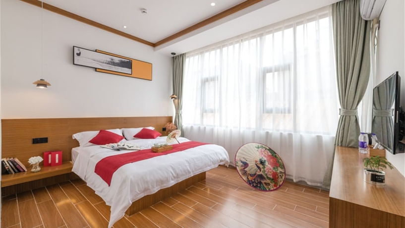 Imagen de la habitación del Hotel Floral Hotel Sanshengyishu Seaview Villa. Foto 5