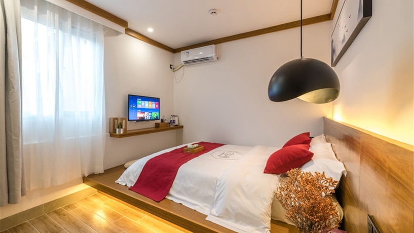 Imagen de la habitación del Hotel Floral Hotel Sanshengyishu Seaview Villa. Foto 6