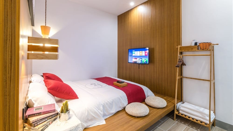 Imagen de la habitación del Hotel Floral Hotel Sanshengyishu Seaview Villa. Foto 8