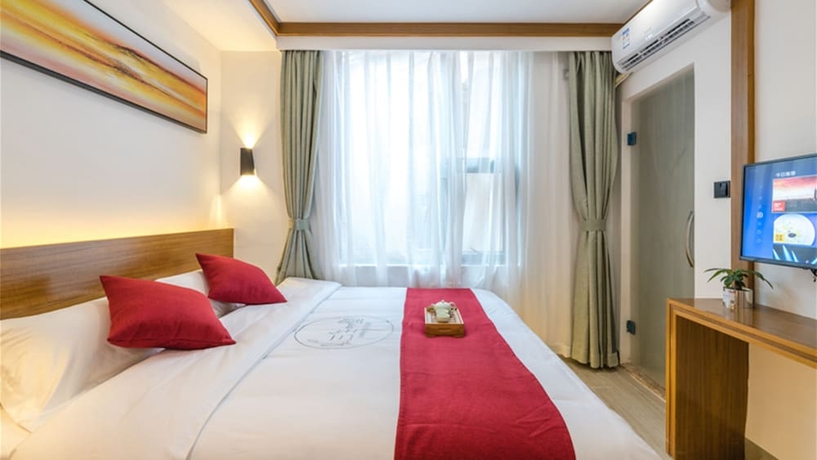 Imagen de la habitación del Hotel Floral Hotel Sanshengyishu Seaview Villa. Foto 10