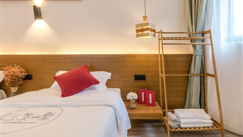 Imagen de la habitación del Hotel Floral Hotel Sanshengyishu Seaview Villa. Foto 11