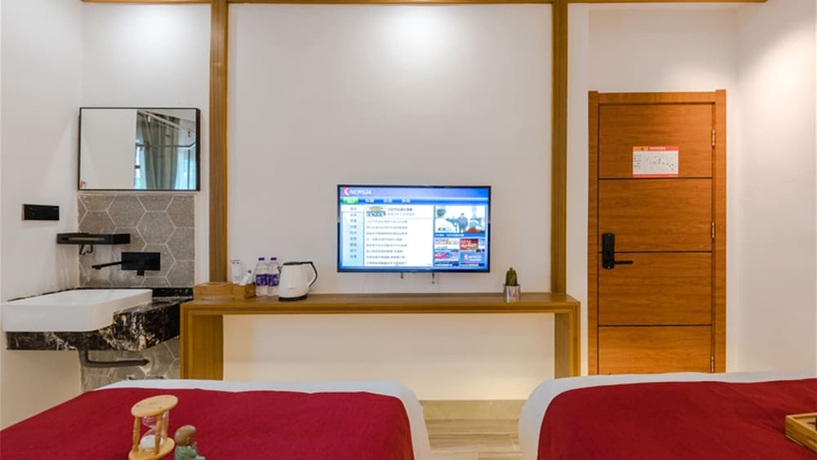 Imagen de la habitación del Hotel Floral Hotel Sanshengyishu Seaview Villa. Foto 15