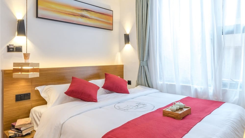 Imagen de la habitación del Hotel Floral Hotel Sanshengyishu Seaview Villa. Foto 16