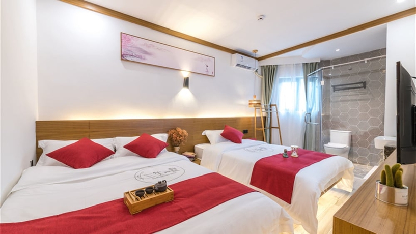 Imagen de la habitación del Hotel Floral Hotel Sanshengyishu Seaview Villa. Foto 18