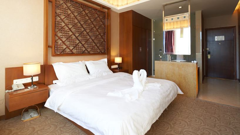 Imagen de la habitación del Hotel Floral Hotel Shangri-la Budange. Foto 2