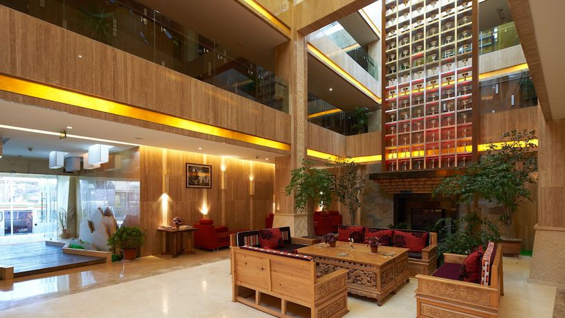 Imagen de la habitación del Hotel Floral Hotel Shangri-la Budange. Foto 6