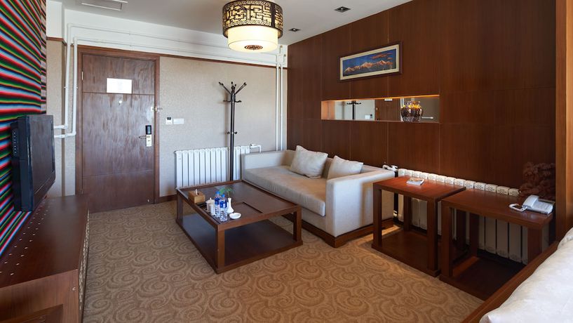 Imagen de la habitación del Hotel Floral Hotel Shangri-la Budange. Foto 11
