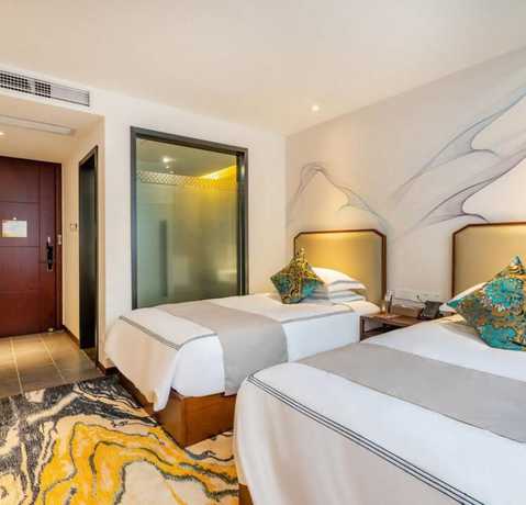 Imagen de la habitación del Hotel Floral Hotel Sheng Poman Courtyard. Foto 5