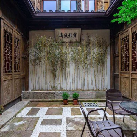 Imagen de la habitación del Hotel Floral Hotel Sheng Poman Courtyard. Foto 7