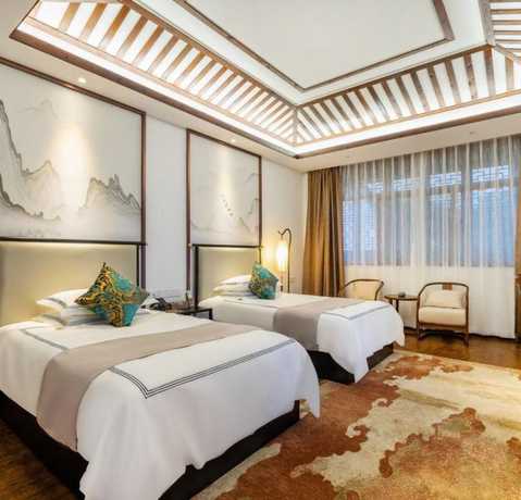 Imagen de la habitación del Hotel Floral Hotel Sheng Poman Courtyard. Foto 8