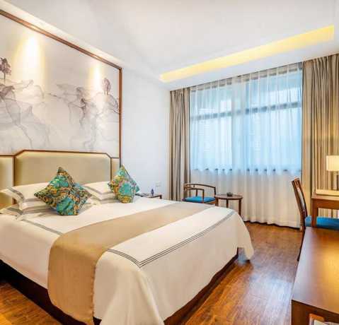 Imagen de la habitación del Hotel Floral Hotel Sheng Poman Courtyard. Foto 16