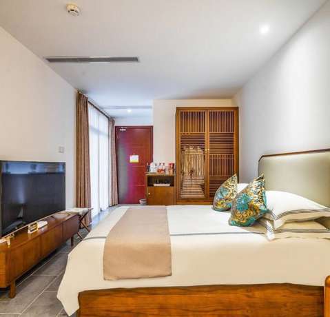 Imagen de la habitación del Hotel Floral Hotel Sheng Poman Courtyard. Foto 17