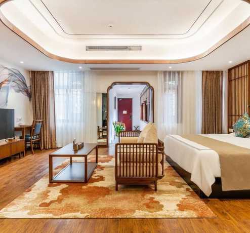 Imagen de la habitación del Hotel Floral Hotel Sheng Poman Courtyard. Foto 18