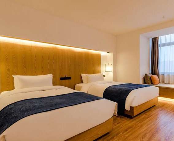 Imagen de la habitación del Hotel Floral Hotel Su Pu Exhibition Center. Foto 4