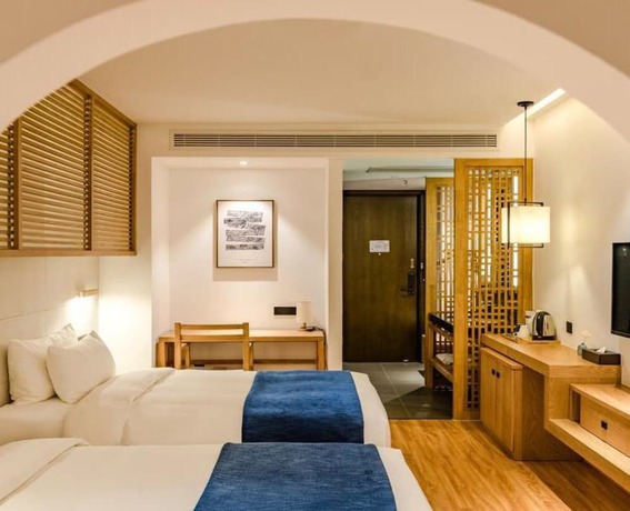 Imagen de la habitación del Hotel Floral Hotel Su Pu Exhibition Center. Foto 9