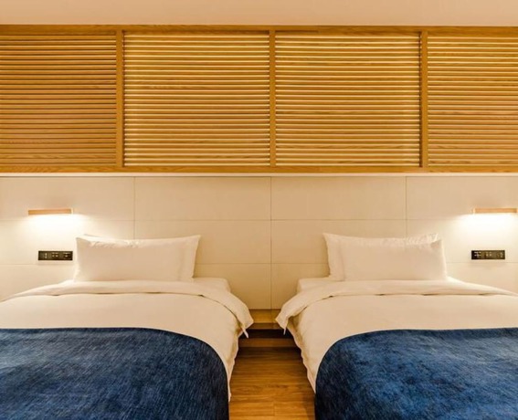 Imagen de la habitación del Hotel Floral Hotel Su Pu Exhibition Center. Foto 10