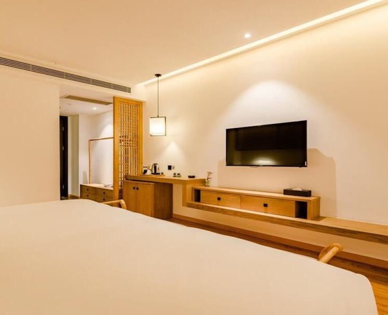 Imagen de la habitación del Hotel Floral Hotel Su Pu Exhibition Center. Foto 11