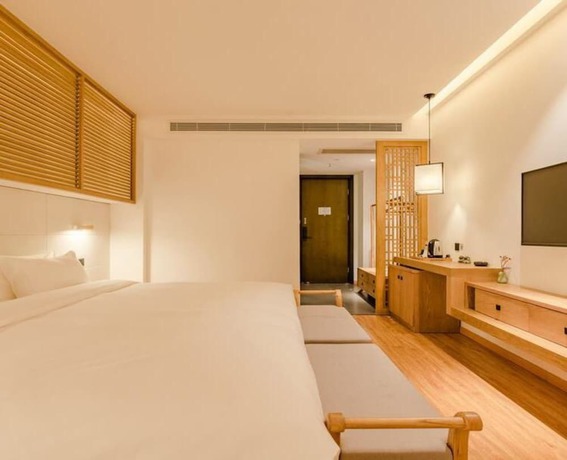 Imagen de la habitación del Hotel Floral Hotel Su Pu Exhibition Center. Foto 13