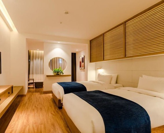 Imagen de la habitación del Hotel Floral Hotel Su Pu Exhibition Center. Foto 14