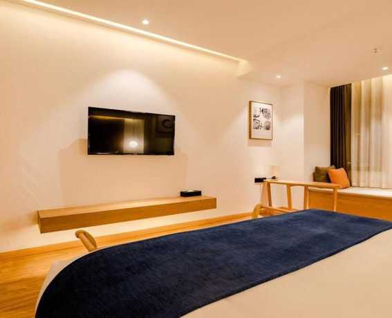 Imagen de la habitación del Hotel Floral Hotel Su Pu Exhibition Center. Foto 15