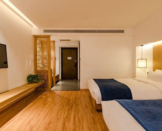 Imagen de la habitación del Hotel Floral Hotel Su Pu Exhibition Center. Foto 16
