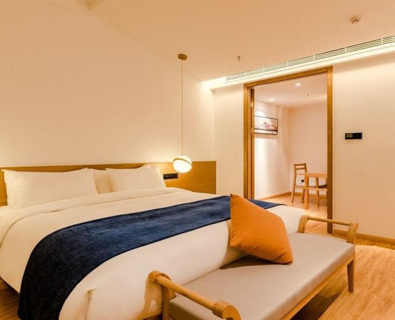 Imagen de la habitación del Hotel Floral Hotel Su Pu Exhibition Center. Foto 18